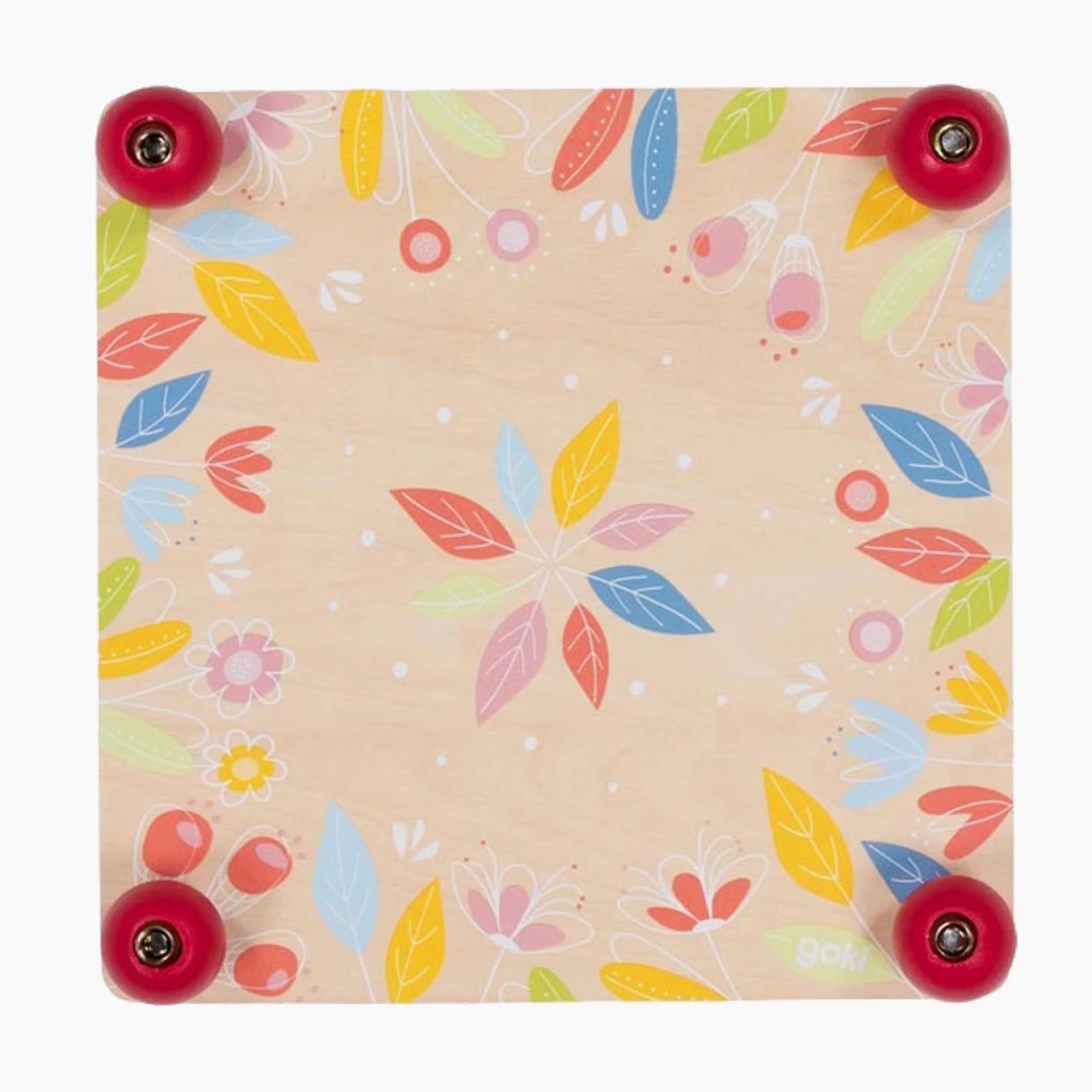 Blumenpresse Blütenzauber von goki mit dekorativem Blumenmotiv und Schrauben