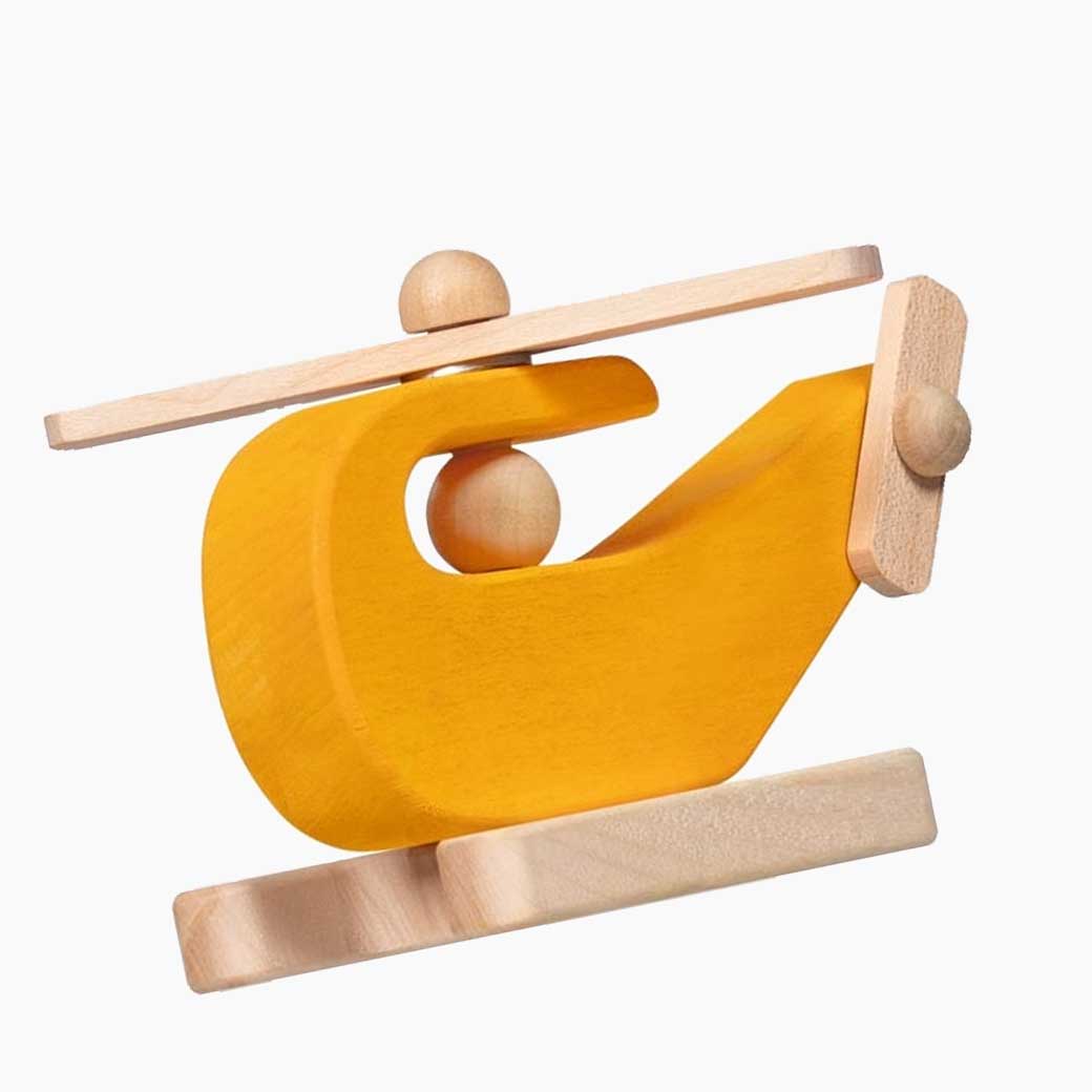 Greiffahrzeug Helikopter Petits Pilotes aus Holz in handlicher Form