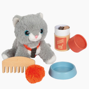 Katze mit Tasche und Pflege-Set